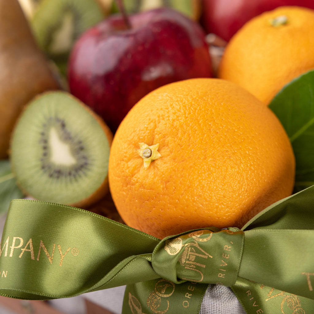 Extra large tropical fruit basket  Top down view of the Festival of Fruit Winter Basket and all of its content Festival of Fruit Gift Basket beautifully arranged with all of its content