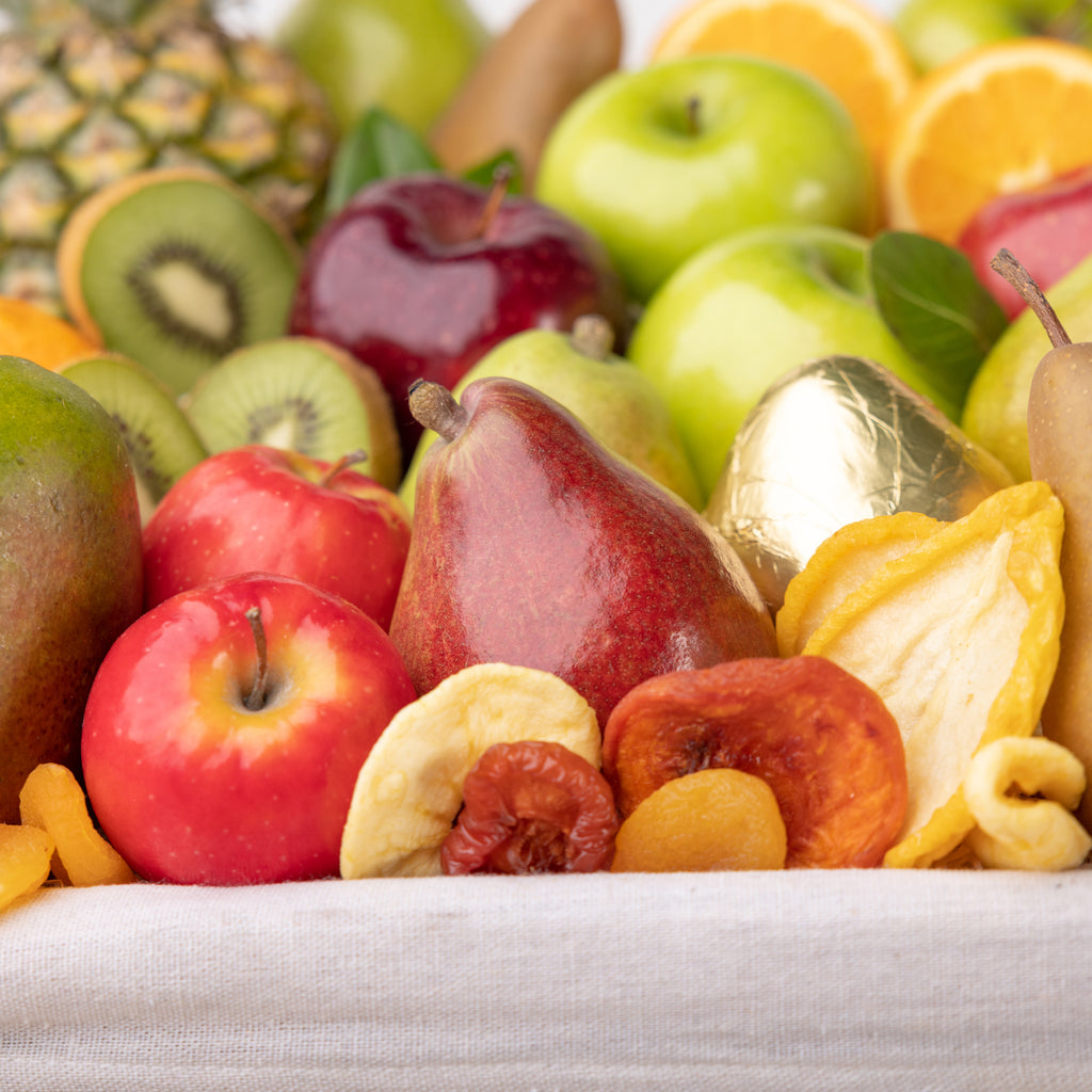 Extra large tropical fruit basket  Top down view of the Festival of Fruit Winter Basket and all of its content Festival of Fruit Gift Basket beautifully arranged with all of its content